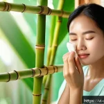 천연비누 오일 - A serene Vietnamese woman with sensitive skin gently washing her face using natural handmade soap en...